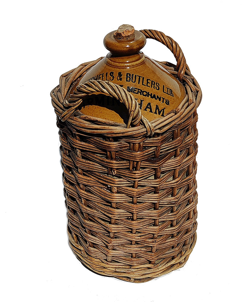 ENGLISH JUG WRAPPED IN WICKER