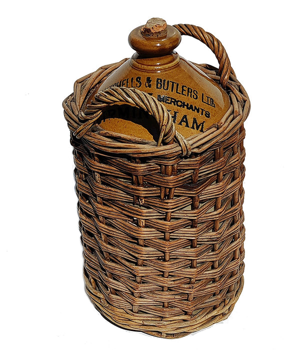 ENGLISH JUG WRAPPED IN WICKER