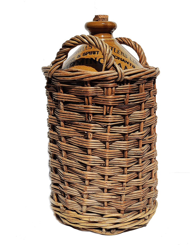 ENGLISH JUG WRAPPED IN WICKER