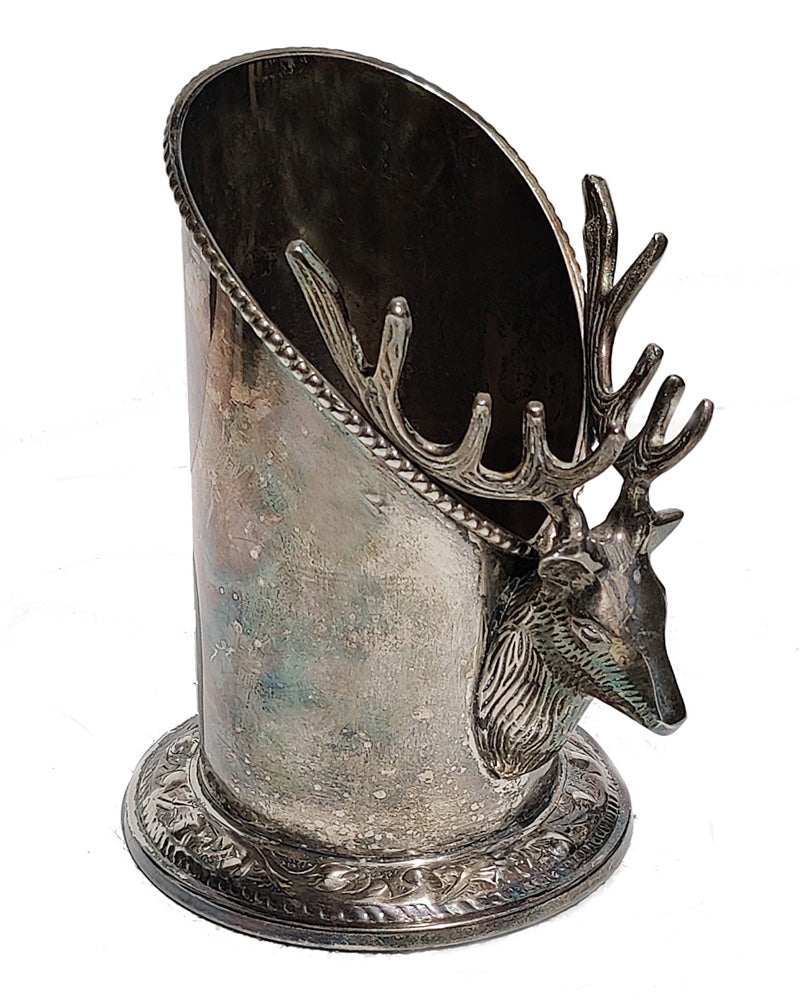 A silver vintage wine of champagne bottle holder with a stag head detail alt